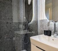 Bathroom shower and sink closeup