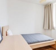 single bed inside the bedroom
