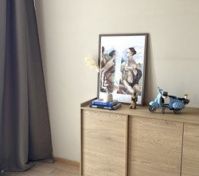 Bedroom dresser with artwork decor