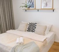 Bright bedroom with double bed