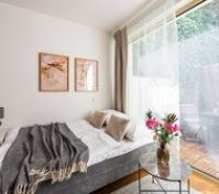 Bright bedroom with terrace access