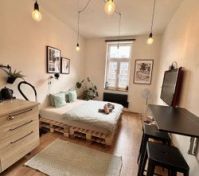 Bright studio room pallet bed desk