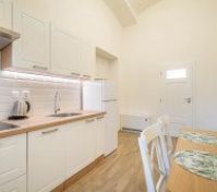 Kitchen and entrances to bathroom, bedroom and hall