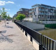 Waterfront promenade near building