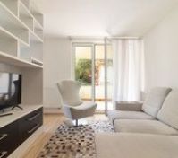 Living room with sofa and balcony