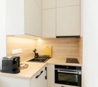 Modern kitchen with oven and cabinets