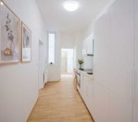 Bright hallway leading to kitchen
