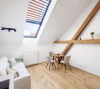 Living room with dining table, skylight