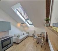 Living area with sofa and dining table