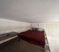 Loft bedroom with double bed