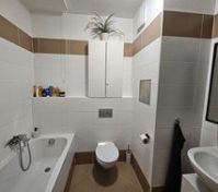Bathroom with tub and toilet