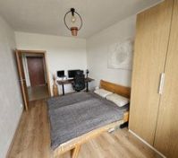 Bedroom with wardrobe and desk