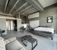 combined living, dining, bedroom