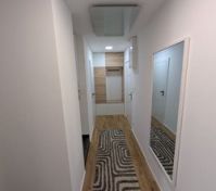 Bright hallway with mirror