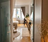 Glass door entry into bright studio