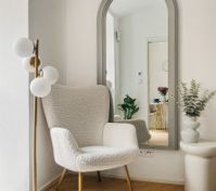 Reading nook with armchair and mirror
