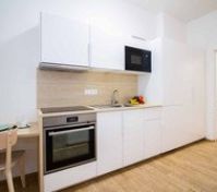 Modern kitchen with oven and microwave
