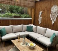 Covered terrace with sectional sofa