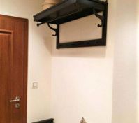 Coat rack with decorative plant