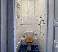 Separate toilet room blue tiles