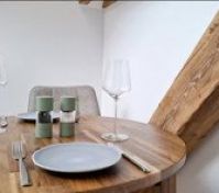 Dining table set with wine glasses