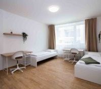 Bright twin bedroom with desks