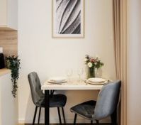 Compact dining table for two