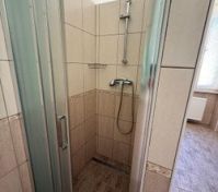Tiled shower cabin closeup