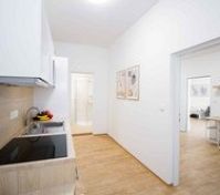 Kitchen area with hallway view
