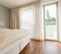  First bedroom oriented to the north away from street, with views over the park Vitkov. Get up refreshed with a birth singing your morning orchestra. All windows within the apartment have installed electric blinds