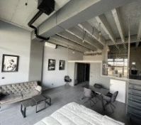 combined living, dining, bedroom