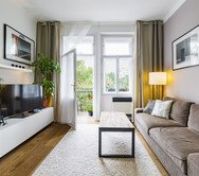 Bright living room with balcony access