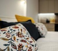 Decorative floral bed pillows closeup