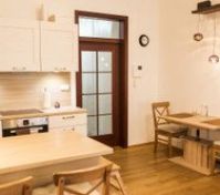 kitchen corner and dining table with two chairs. plus two bar chars. 