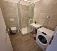 Modern bathroom, washing machine included