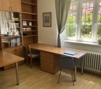 Bright study room with bookshelves