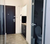 Hallway with kitchenette and bathroom