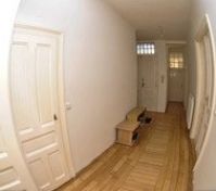 Bright hallway with wooden floors