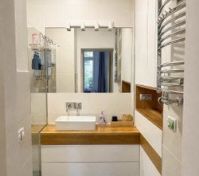 Bathroom vanity with heated towel rail